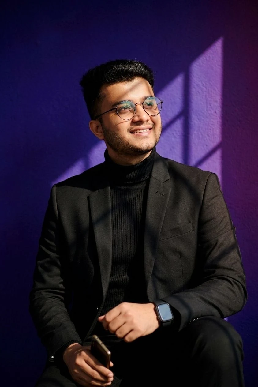 MD IMTIAZ in a black blazer
